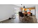 Bright dining area adjacent to the kitchen, featuring modern pendant lighting and direct access to the outdoor patio area at 14974 Dry Creek Rd, Noblesville, IN 46060