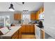 Efficient kitchen with stainless steel appliances, ample counter space, and stylish lighting, perfect for cooking and entertaining at 14974 Dry Creek Rd, Noblesville, IN 46060