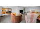 Bright and open-concept living space showcasing modern finishes and an adjoining kitchen, ideal for entertaining and everyday living at 14974 Dry Creek Rd, Noblesville, IN 46060