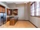 Bright kitchen with wood cabinets, stainless steel appliances, and hardwood floors at 1529 Alabama N St # H, Indianapolis, IN 46202