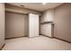 Finished basement area with cabinets and neutral carpeting at 1591 Preston Trl, Carmel, IN 46032