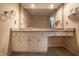 Bright bathroom featuring a neutral countertop, vanity, and modern fixtures creating a serene space at 1591 Preston Trl, Carmel, IN 46032