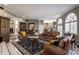 Large open living area boasts neutral walls and a view to the breakfast nook at 1591 Preston Trl, Carmel, IN 46032