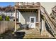 Backyard deck with table and chairs, offering an ideal spot for outdoor dining and relaxation at 1727 N New Jersey St # A, Indianapolis, IN 46202
