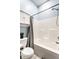 Bright bathroom with a shower-tub combo and modern fixtures at 1727 N New Jersey St # A, Indianapolis, IN 46202