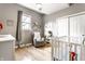 Bright and airy Bedroom with a rocking chair and crib at 1727 N New Jersey St # A, Indianapolis, IN 46202