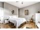 Spacious bedroom featuring hardwood floors, neutral walls, and ample natural light at 1727 N New Jersey St # A, Indianapolis, IN 46202