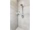 Shower featuring tiled walls, sleek fixtures, and a rainfall showerhead at 1727 N New Jersey St # A, Indianapolis, IN 46202