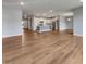 Expansive living area featuring modern finishes and an open layout, seamlessly connecting living and dining spaces at 17877 Haralson Row, Westfield, IN 46074