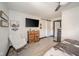 Relaxing bedroom featuring modern decor, TV, and comfortable rocking chair at 1815 Pearl St, Anderson, IN 46016