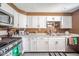 This kitchen has new cabinets and stainless steel appliances at 1815 Pearl St, Anderson, IN 46016