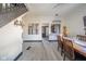 Open-concept living room featuring modern decor, and light gray wood-look flooring at 1815 Pearl St, Anderson, IN 46016