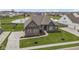 Beautiful home on a serene lot with a pond view in a desirable neighborhood at 18271 Lake Winds Dr, Westfield, IN 46074
