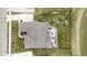 Aerial view of the backyard featuring outdoor patio and meticulous landscaping at 18271 Lake Winds Dr, Westfield, IN 46074
