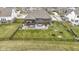 Landscaped backyard featuring an outdoor patio and entertainment space at 18271 Lake Winds Dr, Westfield, IN 46074