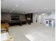 Large finished basement with a play area, bar, and ample room for entertaining at 18271 Lake Winds Dr, Westfield, IN 46074
