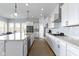 Contemporary kitchen featuring a center island, gas range, and stainless steel appliances at 18271 Lake Winds Dr, Westfield, IN 46074