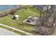 Community playground and picnic shelter on a grassy lot near a sidewalk and street at 18271 Lake Winds Dr, Westfield, IN 46074