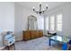 Bright playroom with hardwood floors, a modern chandelier, and fun furniture at 18271 Lake Winds Dr, Westfield, IN 46074