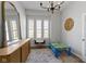 ' playroom boasting a playful theme with a large mirror and light-filled windows at 18271 Lake Winds Dr, Westfield, IN 46074