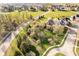 Expansive home boasts lush landscaping, mature trees, and inviting curb appeal in a desirable neighborhood at 1997 Finchley Rd, Carmel, IN 46032
