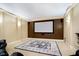 Basement boasts home theater with a large screen and plush theater chairs at 1997 Finchley Rd, Carmel, IN 46032