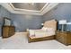 Comfortable bedroom boasts neutral colors, soft carpet, and stylish furniture at 1997 Finchley Rd, Carmel, IN 46032