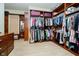 Walk-in closet with custom shelving and ample storage space at 1997 Finchley Rd, Carmel, IN 46032