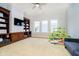 Well-lit playroom with built-in bookshelves and a cozy seating area at 1997 Finchley Rd, Carmel, IN 46032
