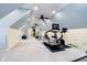 Spacious home gym with modern exercise equipment and great lighting at 1997 Finchley Rd, Carmel, IN 46032