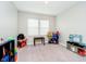 Neutral bedroom with carpet, large windows providing natural light, and ample open space at 19992 Fenside Xing, Westfield, IN 46074