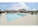 Community pool and cabana area with comfortable seating for residents to relax and enjoy the outdoors at 19992 Fenside Xing, Westfield, IN 46074