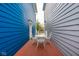 Charming outdoor back deck with patio table between two colorful homes at 2067 Rhettsbury St, Carmel, IN 46032
