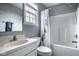 A full bathroom with a tub and shower combo, a window and neutral colors at 2067 Rhettsbury St, Carmel, IN 46032