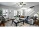 Bright and airy living room with hardwood floors, neutral tones, and an open layout for modern living at 2067 Rhettsbury St, Carmel, IN 46032