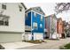 Street view of colorful homes featuring garages and attractive landscaping at 2067 Rhettsbury St, Carmel, IN 46032