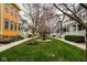 Beautiful street view with colorful homes and a decorative water fountain at 2067 Rhettsbury St, Carmel, IN 46032