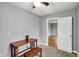 Bedroom featuring neutral carpet and gray walls at 214 W Elbert St, Indianapolis, IN 46217