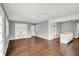 Spacious living room featuring hardwood floors and a built-in entertainment center at 214 W Elbert St, Indianapolis, IN 46217