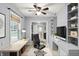 Home office with built-in shelves, desk, and a comfortable chair at 214 W Elbert St, Indianapolis, IN 46217