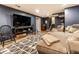 Finished basement with large TV and seating area at 224 Brierley Way, Carmel, IN 46032