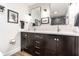 Elegant bathroom featuring a double vanity with sleek fixtures and modern design at 224 Brierley Way, Carmel, IN 46032