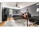 Comfortable bedroom with a ceiling fan, hardwood floors, and a cozy workspace at 224 Brierley Way, Carmel, IN 46032