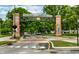 Carmel Arts & Design District entrance featuring brick pillars and a decorative archway, welcoming visitors at 224 Brierley Way, Carmel, IN 46032