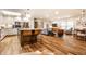 Open-concept living area with a modern kitchen, creating a spacious environment for entertaining and relaxing at 224 Brierley Way, Carmel, IN 46032