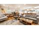 Bright and open living space with comfortable seating and a kitchen view at 224 Brierley Way, Carmel, IN 46032