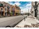 Street view in Carmel featuring sidewalks, street lamps and buildings with shops and restaurants at 224 Brierley Way, Carmel, IN 46032