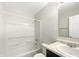 Bright bathroom featuring a tub with shower, sink with stylish countertop and vanity, and modern fixtures at 2350 Bridlewood Dr, Franklin, IN 46131