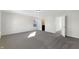 Spacious and well-lit bedroom with neutral carpet and an open doorway at 2350 Bridlewood Dr, Franklin, IN 46131