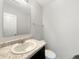 Neutral half bathroom features a modern vanity, white sink, and clean, bright lighting for a functional and inviting space at 2350 Bridlewood Dr, Franklin, IN 46131